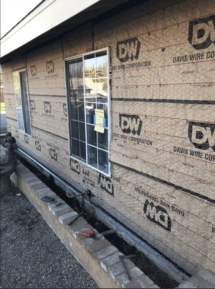 Chicken wire installed before re-installing stucco in Downey, CA.